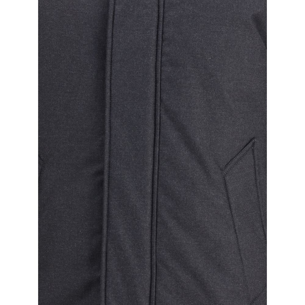 Close-up of Woolrich Black Fleece Wool Parka showing quilted design and side welt pockets.