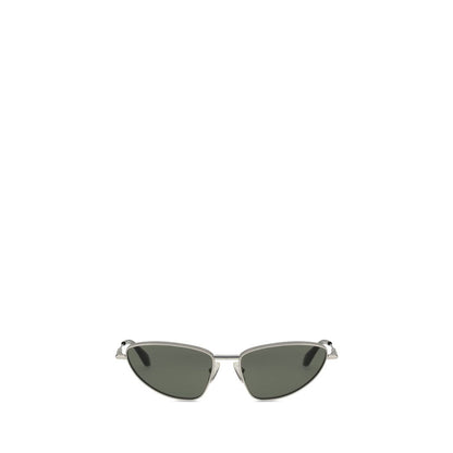 Alexander McQueen Silver Metal Sunglasses with cat-eye design, mirrored lenses, engraved logo, and acetate tips.