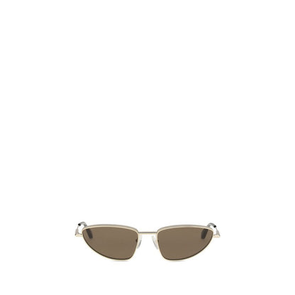 Alexander McQueen Gold Metal Sunglasses with cat-eye design and mirrored lenses.