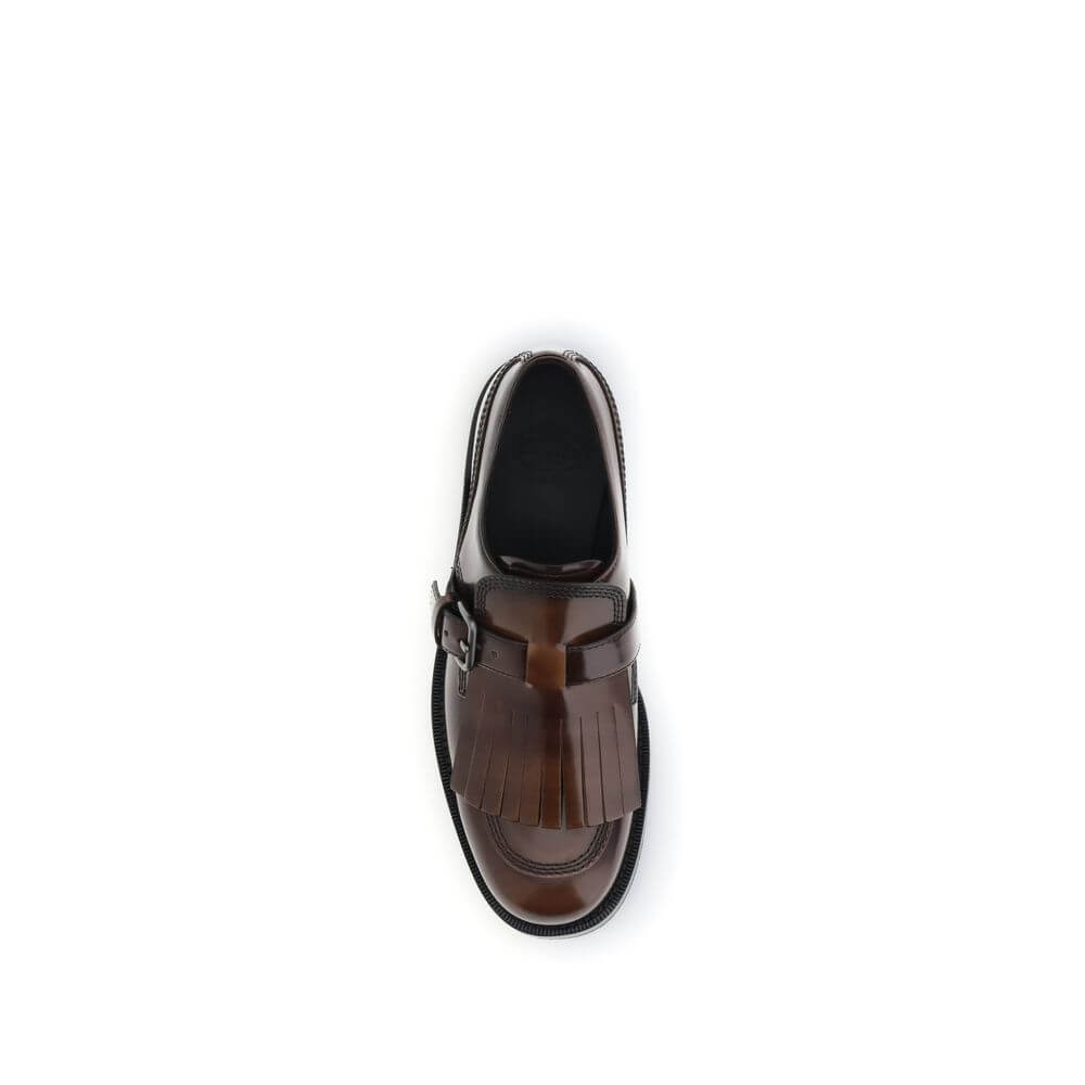 Top view of Church's Brown Calf Leather Bos Taurus Oxfords and Derbies with buckle and fringe detail, made in Italy.