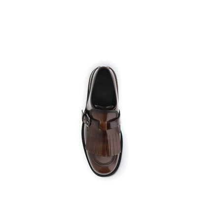 Top view of Church's Brown Calf Leather Bos Taurus Oxfords and Derbies with buckle and fringe detail, made in Italy.