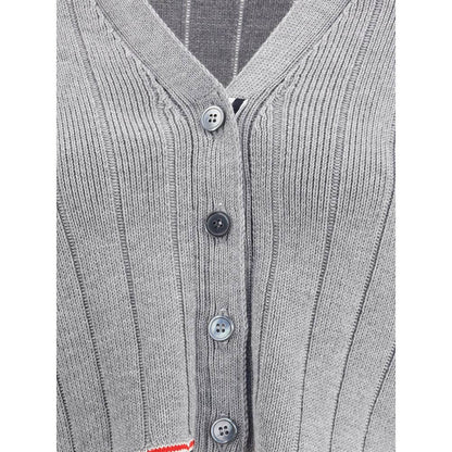 Close-up of Thom Browne Gray Fleece Wool Cardigan with button closure and ribbed design.