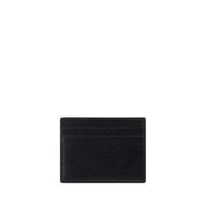 Saint Laurent Black Calf Leather Bos Taurus Wallet, sleek design with card slots and iconic monogram, made in Italy.
