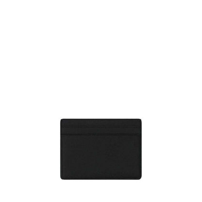 Saint Laurent Black Calf Leather Bos Taurus Wallet with embossed logo, two card slots, and coin pocket, made in Italy.