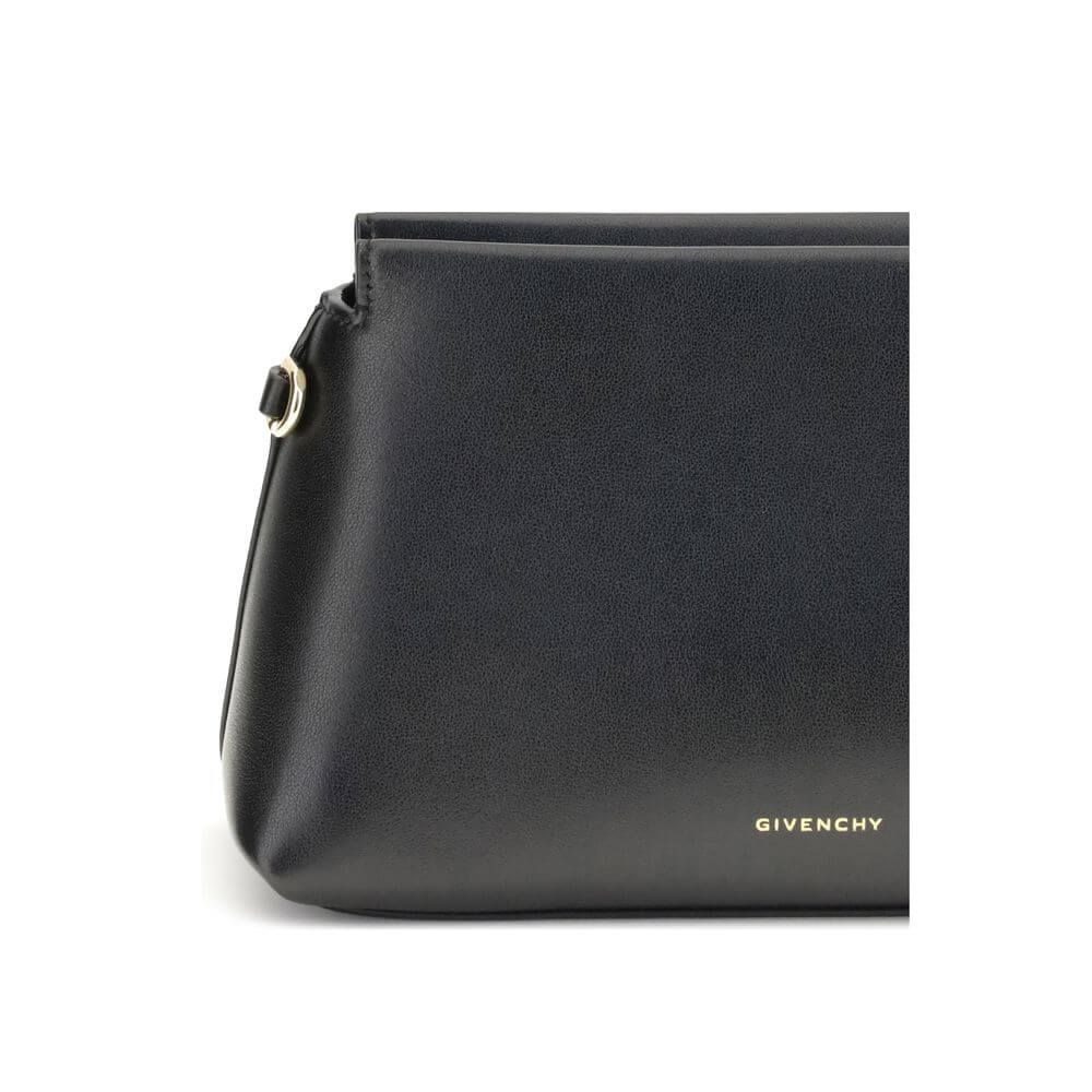 Givenchy Black Calf Leather Bos Taurus Clutch Bag with gold-tone details and logo, featuring zipper closure and leather strap.