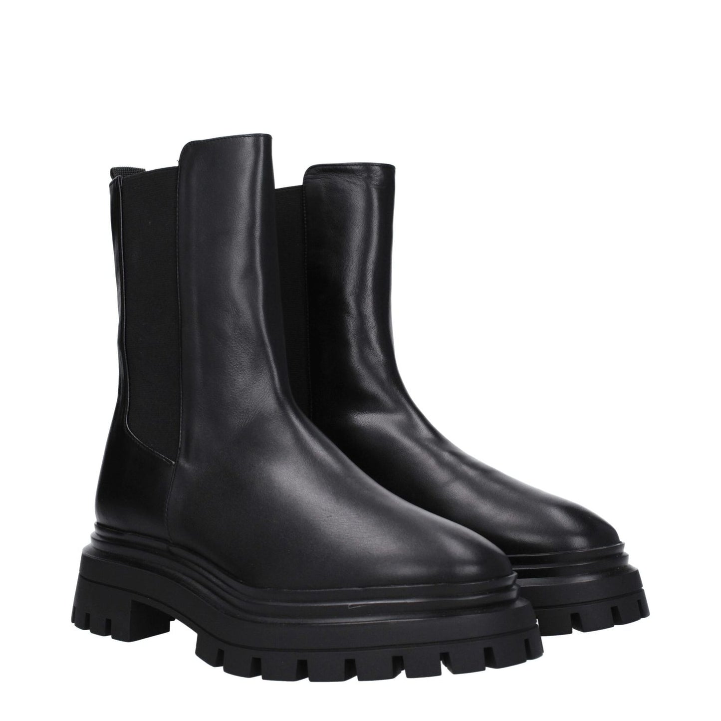 Stuart Weitzman Black Leather Ankle Boots with rubber sole, mid heel, and round toe. MPN: BEDFORDCHISC754BLACK. Style: Casual.