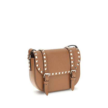 Valentino Garavani Beige Calf Leather Bos Taurus Shoulder Bag with iconic studs and adjustable strap, perfect for chic style.