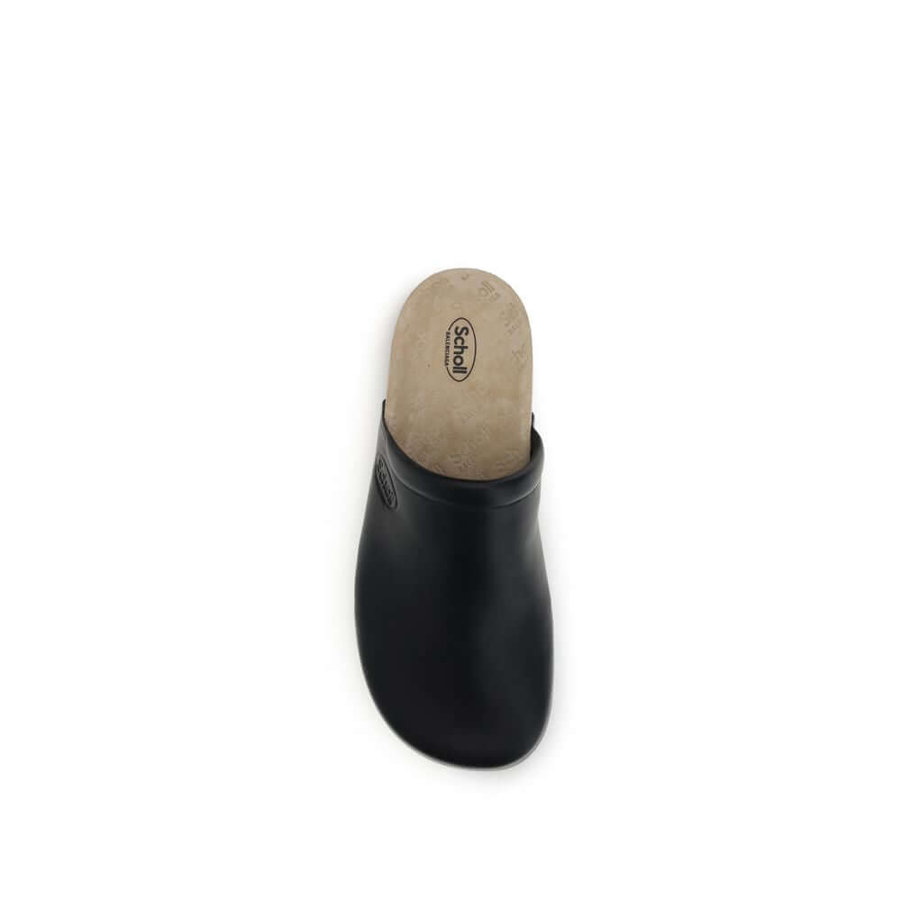 Top view of a Balenciaga Black Calf Leather Bos Taurus Mule with a cork insole and logo-embossed footbed, showcasing modern style and comfort.