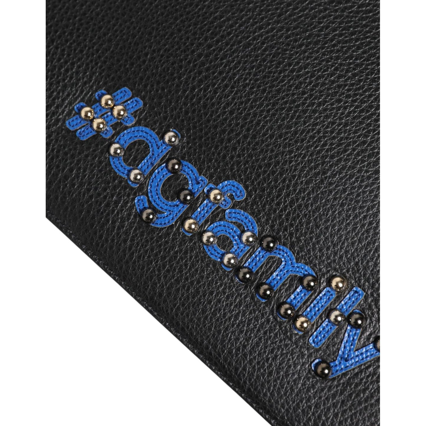 Close-up of Dolce & Gabbana Black Leather #DGFAMILY Embellished Men Clutch Pouch Bag with studded applique detail.