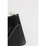 Close-up of Dolce & Gabbana Black Leather Logo Embossed Waist Fanny Pack Borse Bag showing zipper and fabric detail.