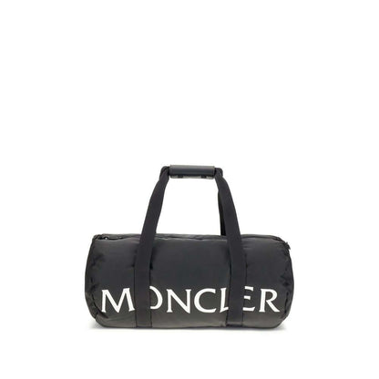 Moncler Black Nylon Luggage And Travel duffle bag with logo, leather-tab handles, detachable strap, and zip closure.