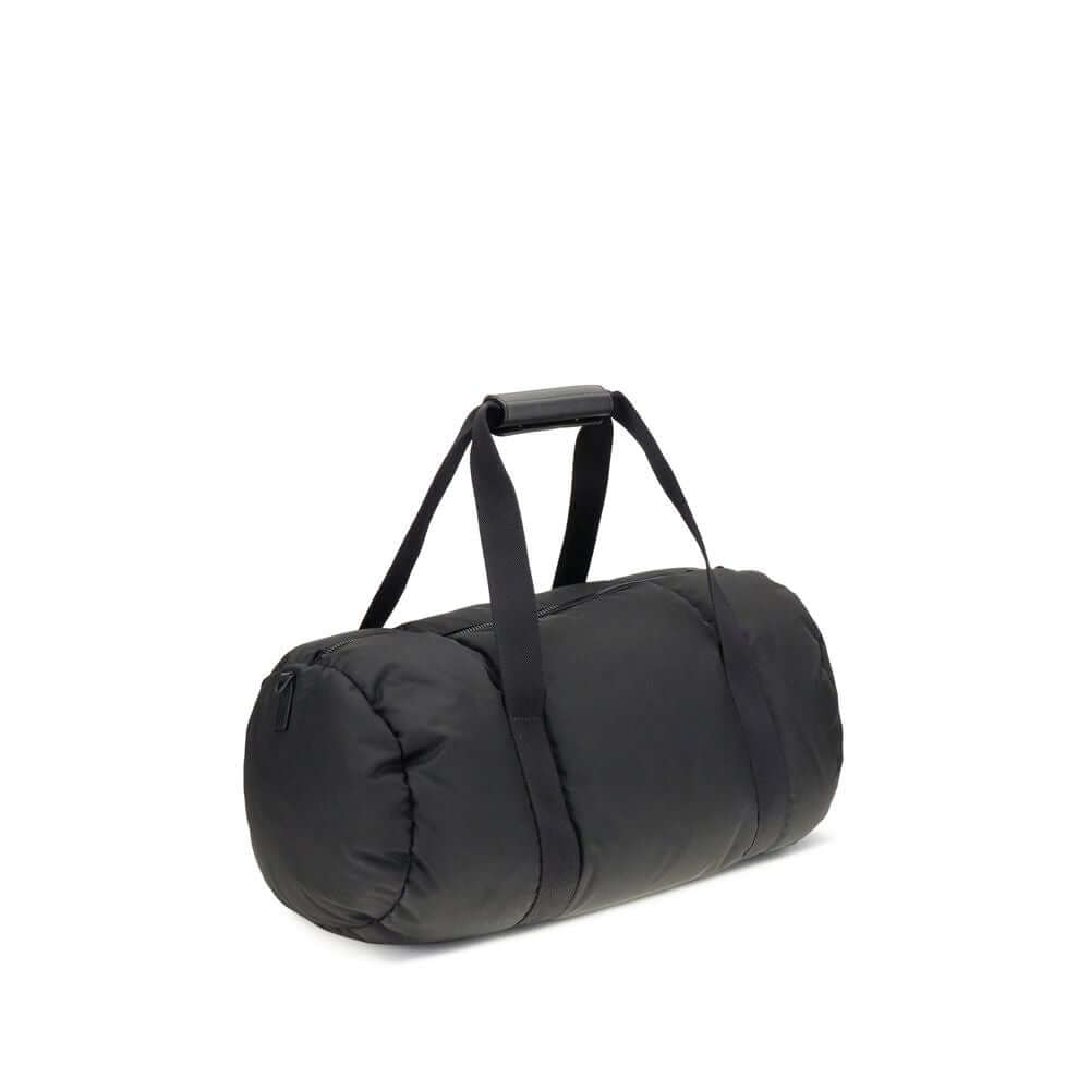Moncler Black Nylon Luggage And Travel duffle bag with leather-tab handles and adjustable strap, featuring heat-sealed logo.