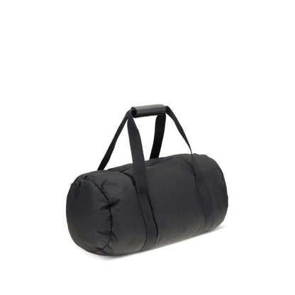 Moncler Black Nylon Luggage And Travel duffle bag with leather-tab handles and adjustable strap, featuring heat-sealed logo.
