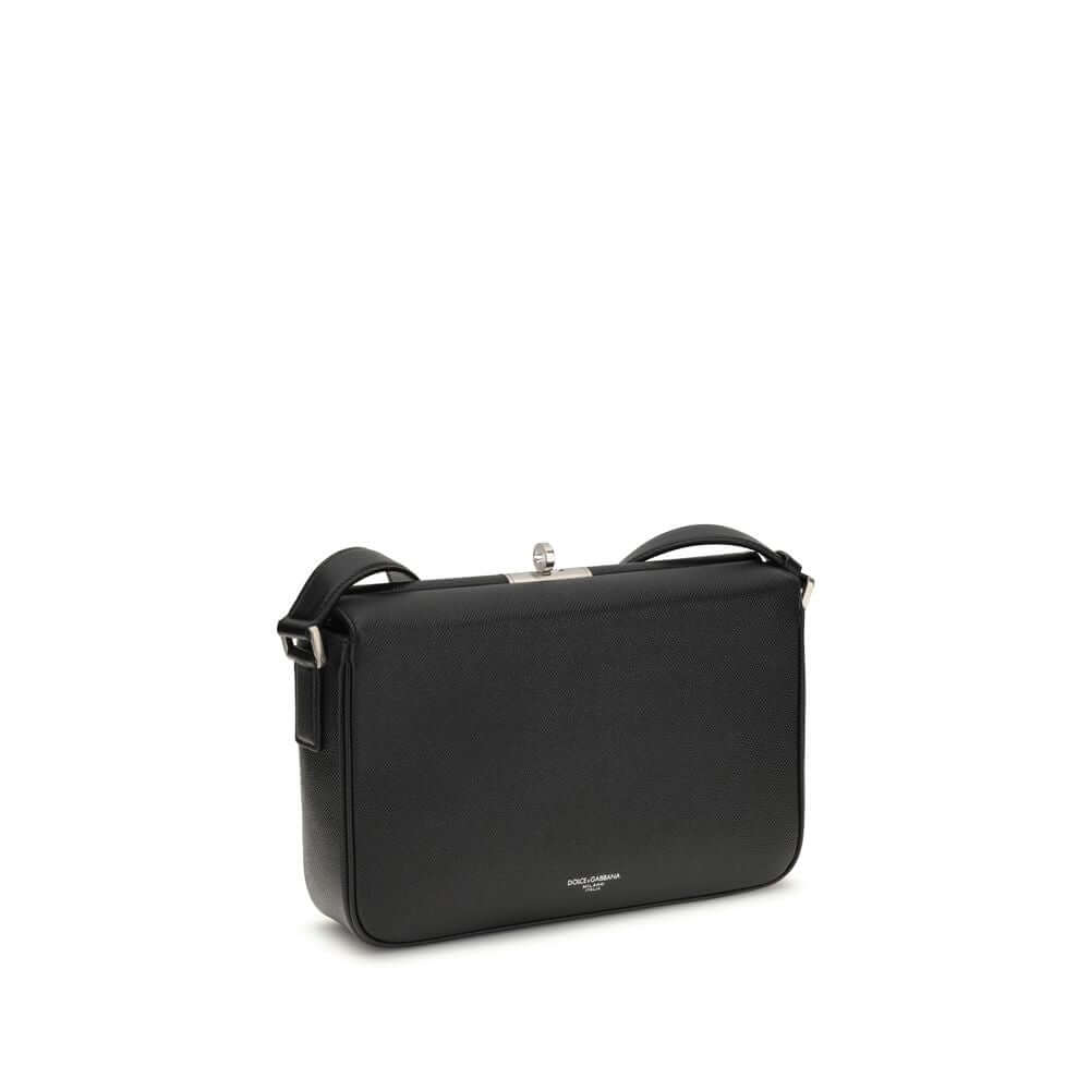 Dolce & Gabbana Black Calf Leather Bos Taurus Shoulder Bag with adjustable strap and antique palladium zipper closure.