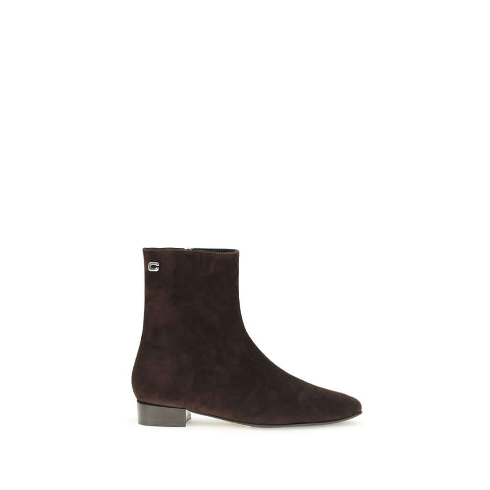 Carel Paris Brown Leather Ankle Boots with 1960s-inspired design and block heel, ideal for fall-winter fashion.