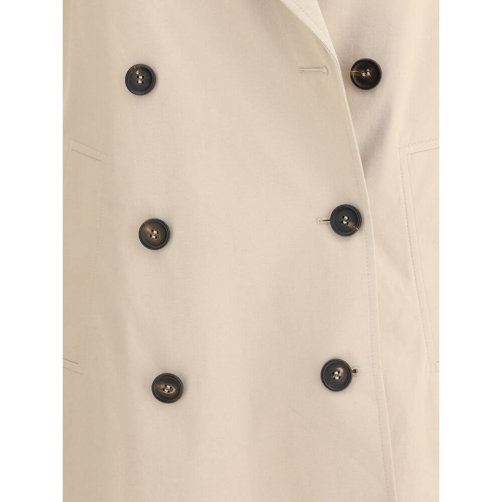 Close-up of Brunello Cucinelli Beige Cotton Coat featuring double-breasted closure and decorative buttons, made from cotton and polyester blend.