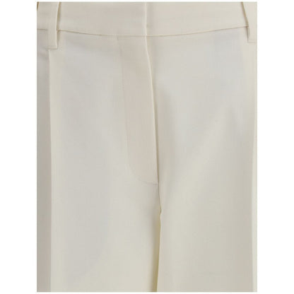 Close-up of Brunello Cucinelli White Cotton Chino Pants showcasing tailored pleats and cropped ankle length design.