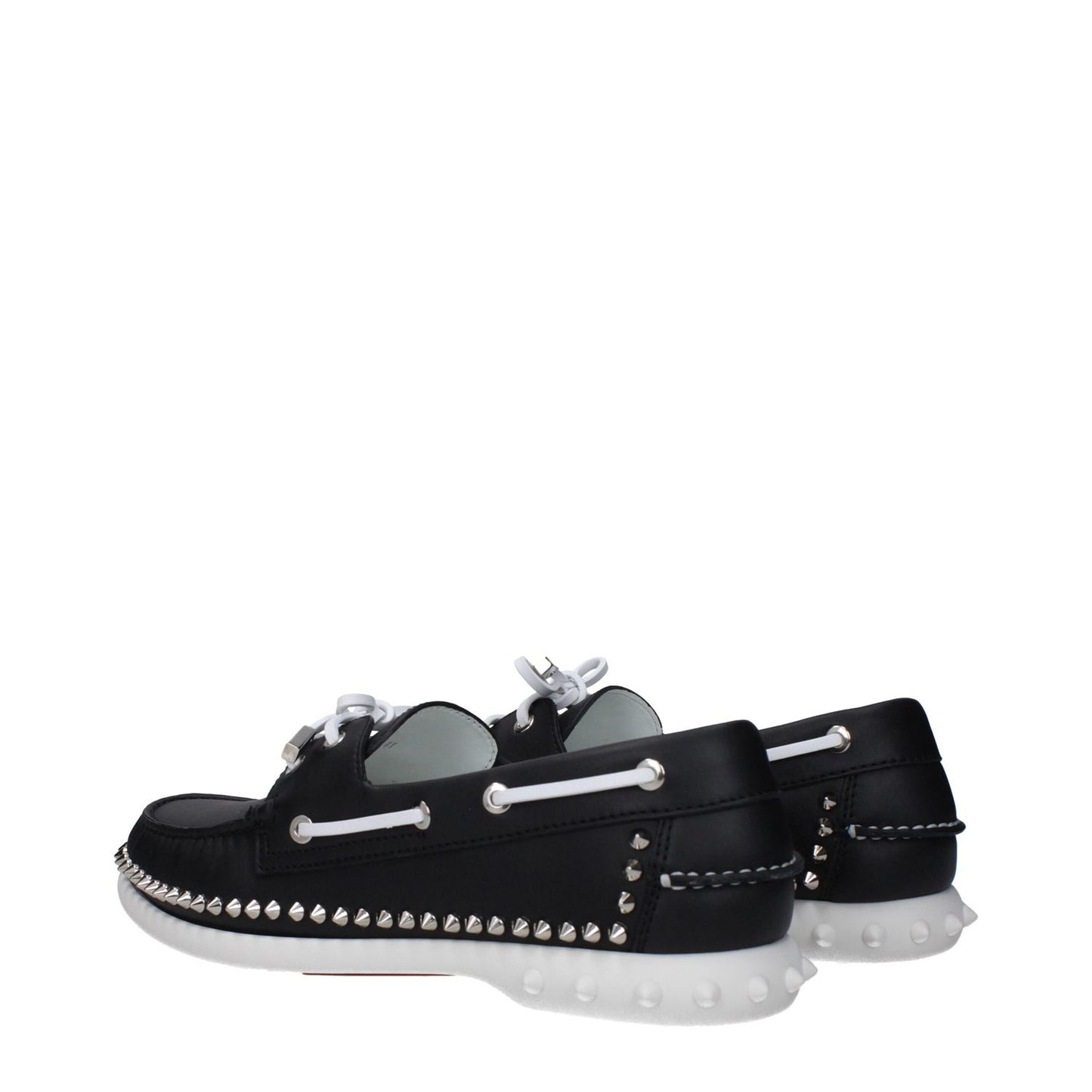 Christian Louboutin Black Leather Slip-On Loafers featuring studs, round toe, and rubber sole.
