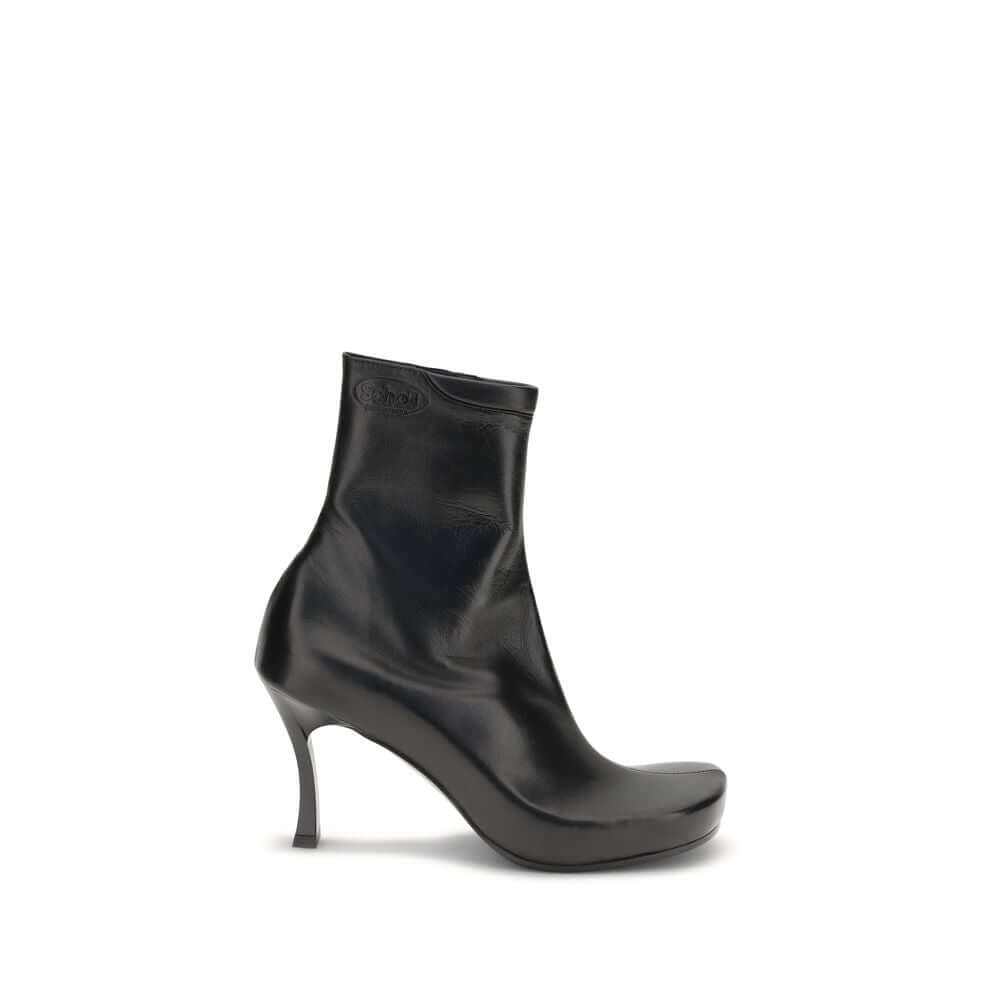 Balenciaga Black Calf Leather Bos Taurus Ankle Boots with square toe and embossed logos, featuring ergonomic insole and high heel.