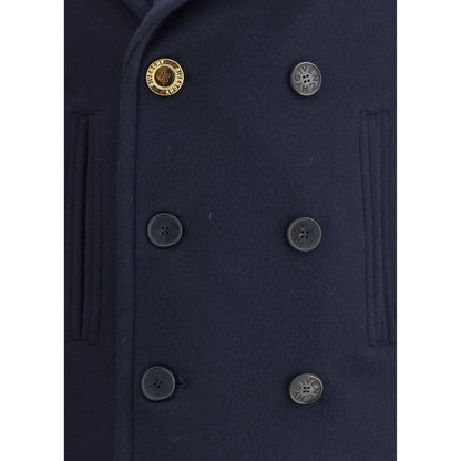 Close-up of Givenchy Blue Wool Coat with double-breasted buttons and welt pockets, showcasing its classic and sophisticated design.