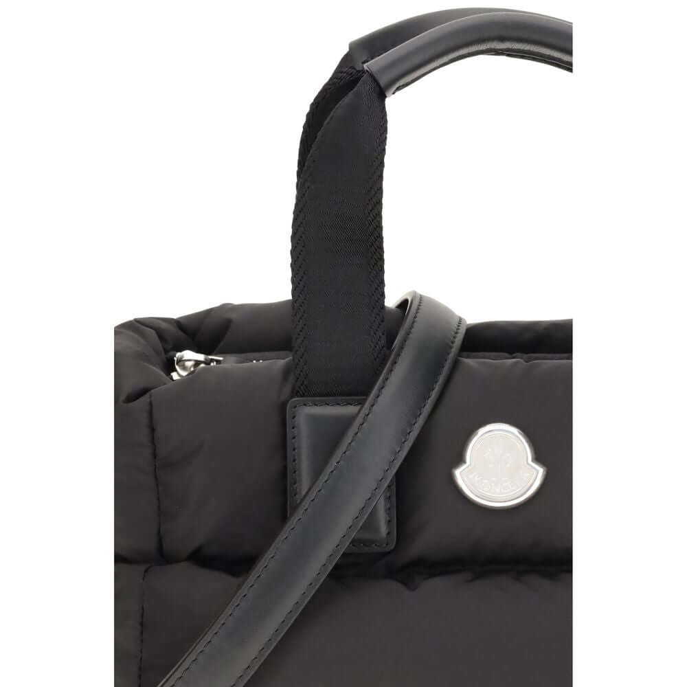 Moncler Black Polyamide Handbag featuring leather grips and detachable shoulder strap.
