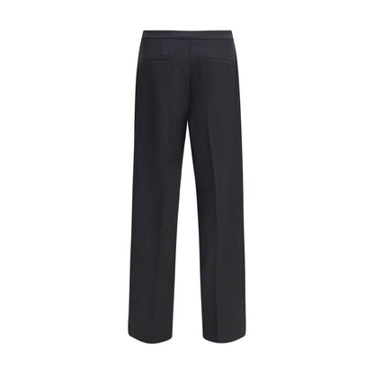 Rear view of Cruna Black Polyester Casual Pants with wide leg silhouette and back welt pockets, ideal for versatile and refined looks.