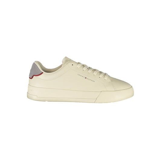 Tommy Hilfiger Beige Leather Men Sneaker with grey accents and signature logo, side view showcasing sleek sporty design.