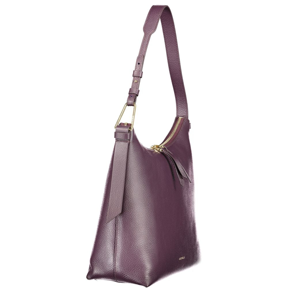 Coccinelle Purple Leather Women Handbag with adjustable strap and zip closure showcasing Italian design and craftsmanship.