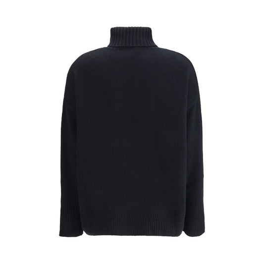 Back view of Allude Turtleneck Sweater in black cashmere, showcasing high collar and ribbed cuffs for elegance and comfort.