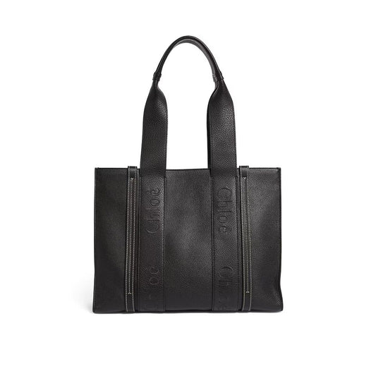 Chloé Black Leather Tote Bag with double shoulder strap and interior slip pocket, made in Italy for women.