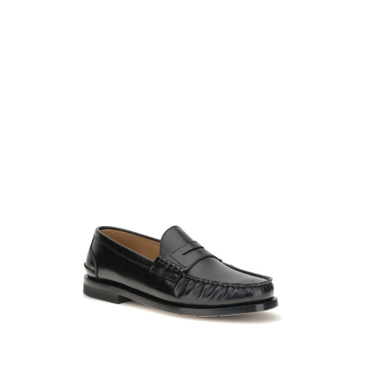 Premiata Arnold Loafers in black calfskin leather with parabout stitching, showcasing craftsmanship and timeless design. Made in Italy.