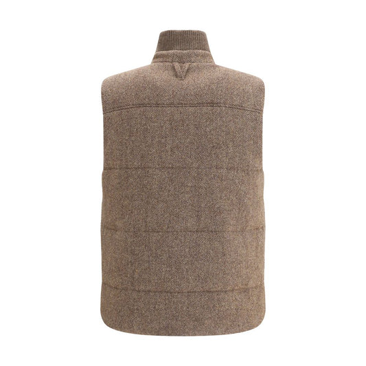 Back view of Valstar Padded wool Vest with quilted design, ribbed collar, and patch pockets, showcasing its elegant and practical style.