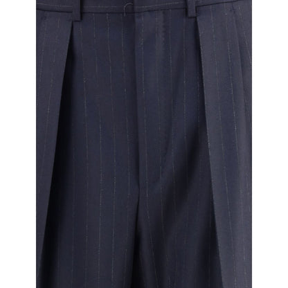 Close-up of Tom Ford Blue Wool Dress Pants with pinstripe design, featuring front pleats, perfect for a formal and sophisticated look.