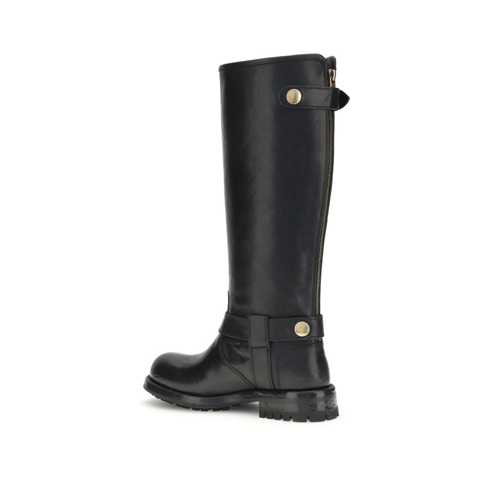 Dolce & Gabbana Black Calf Leather Bos Taurus Lace-Up Boots with matte gold buckle and durable leather insole, side view.
