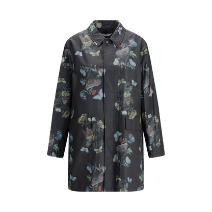 Undercover Black Cotton Coat with floral pattern, front view. Waxed cotton raincoat with flap pockets and cotton lining, AW25 collection.