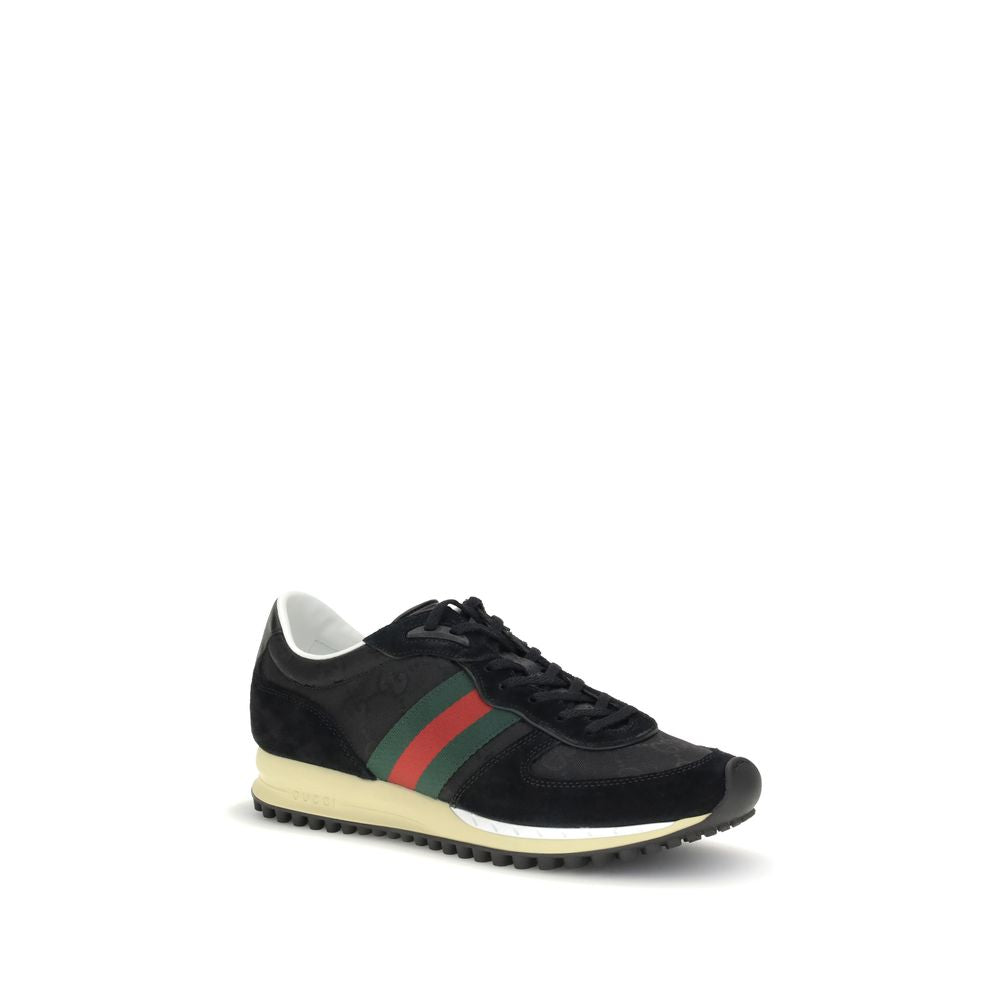 Gucci Black Polyamide Athletic Sneakers with green and red Web stripe, suede trim, and Interlocking GG logo on rubber sole.
