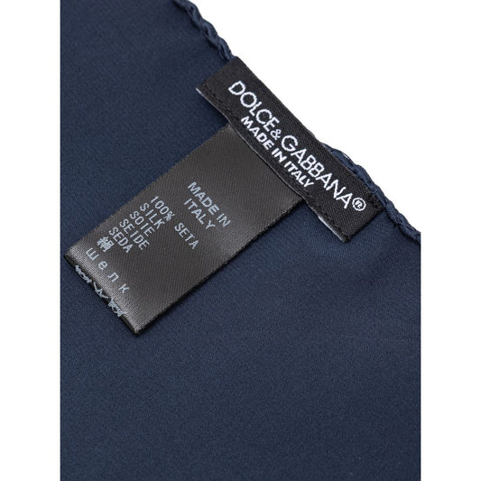 Dolce & Gabbana Blue Silk Pocket Square with label detail showing 100% silk composition. SKU: GR412E FU1AU, size 31x31cm.