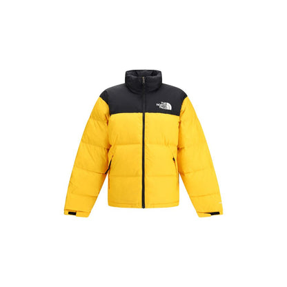 The North Face Yellow Polyamide Shell Jacket with high collar and removable hood, quilted with contrasting black and yellow design.
