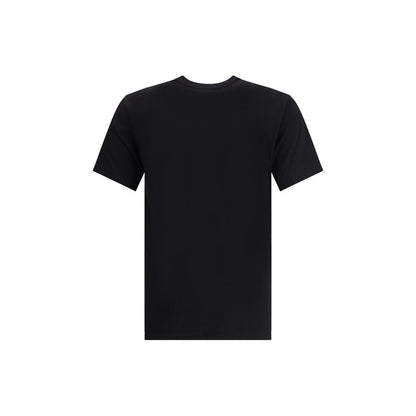Commes Des Garçons Black Cotton T-Shirt with short sleeves and a round neckline, minimalist style, made in Turkey, front view.