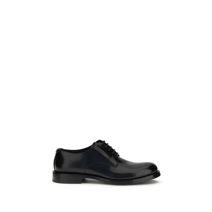 Dolce & Gabbana Black Calf Leather Bos Taurus Oxfords And Derbies, polished luxury lace-up shoes for modern men.