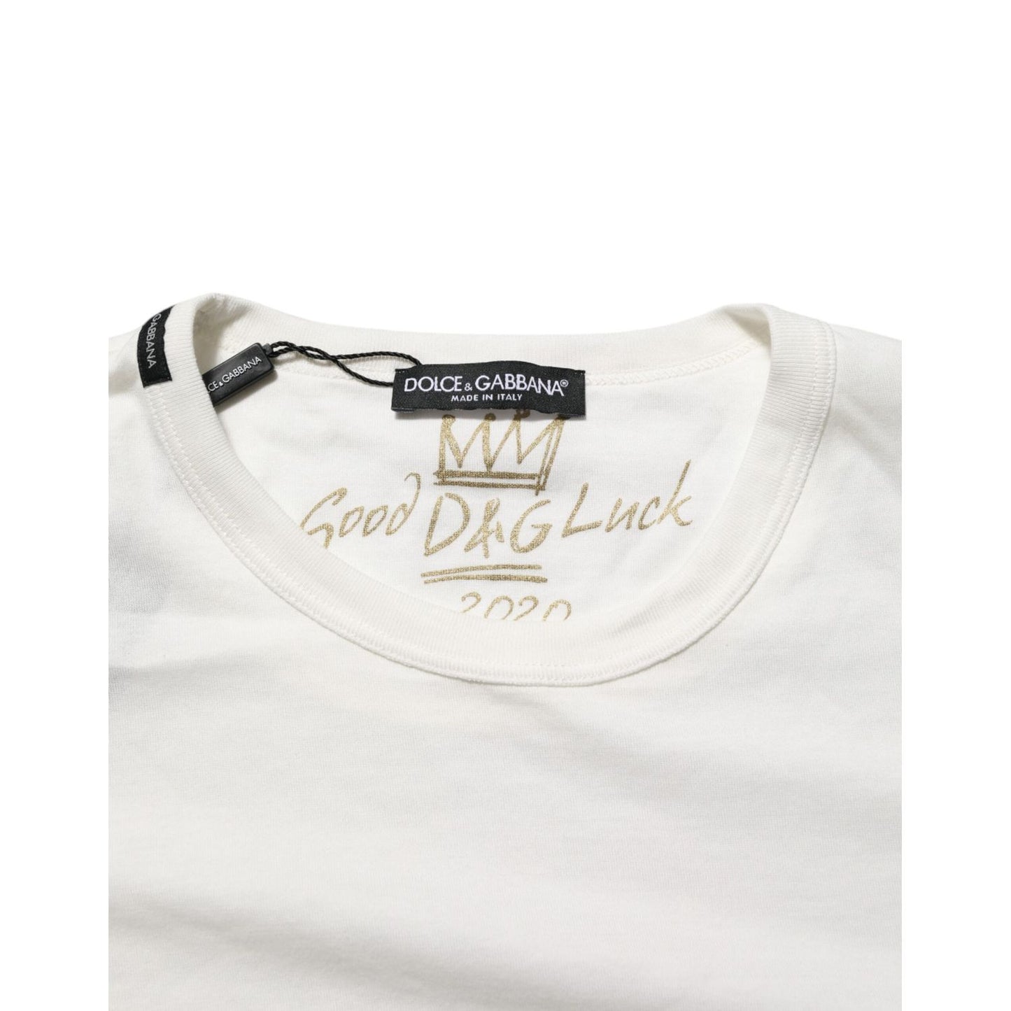 Close-up of Dolce & Gabbana White Cotton Goodluck 2020 Crew Neck T-shirt with bold text and soft fabric texture.