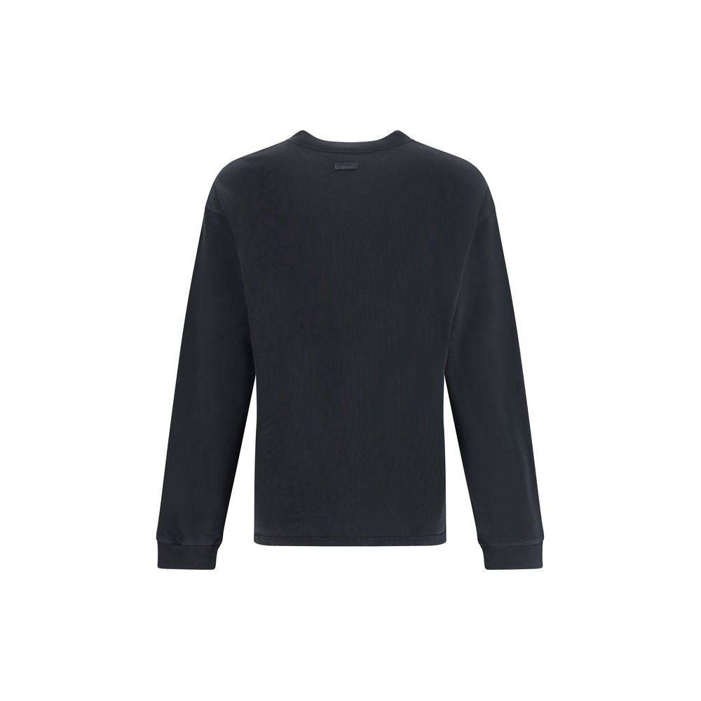 Dolce & Gabbana Black Cotton Sweatshirt with long sleeves and ribbed detailing, shown from the back. Crafted for everyday elegance.