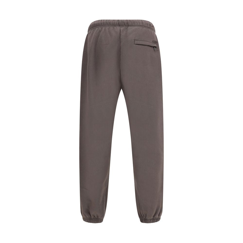 Dolce & Gabbana Brown Cotton Joggers (Workout Pants) with elastic waistband and pockets, back view.