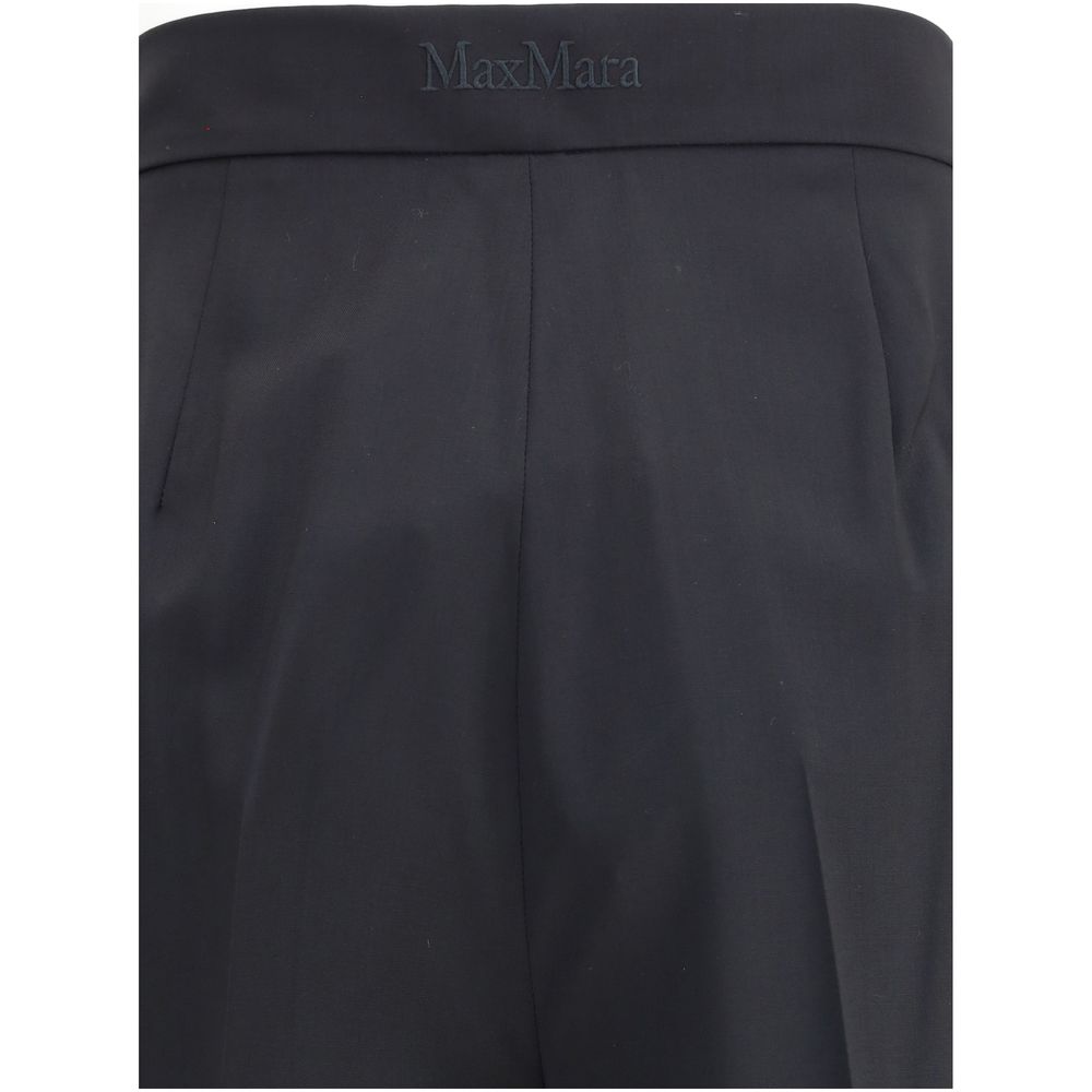 Max Mara Black Fleece Wool Casual Pants with high-waisted silhouette and welt pockets, ideal for sophisticated office looks.