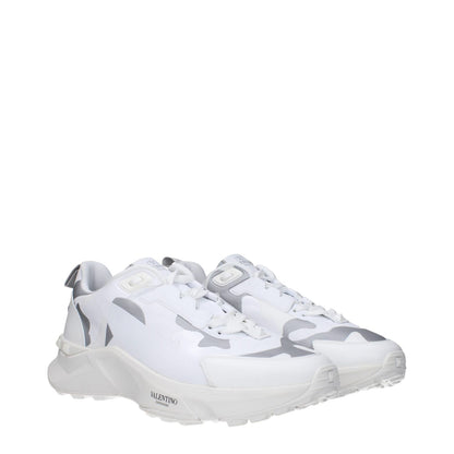 Valentino Garavani White Fabric Athletic Sneakers with logos on front, side, back, sporty glam style, lace up closure, and light grey details.
