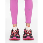 Adidas By Stella McCartney Trousers Purple with logo print, fuchsia pink waistband, Balenciaga sneakers, 7/8 length.