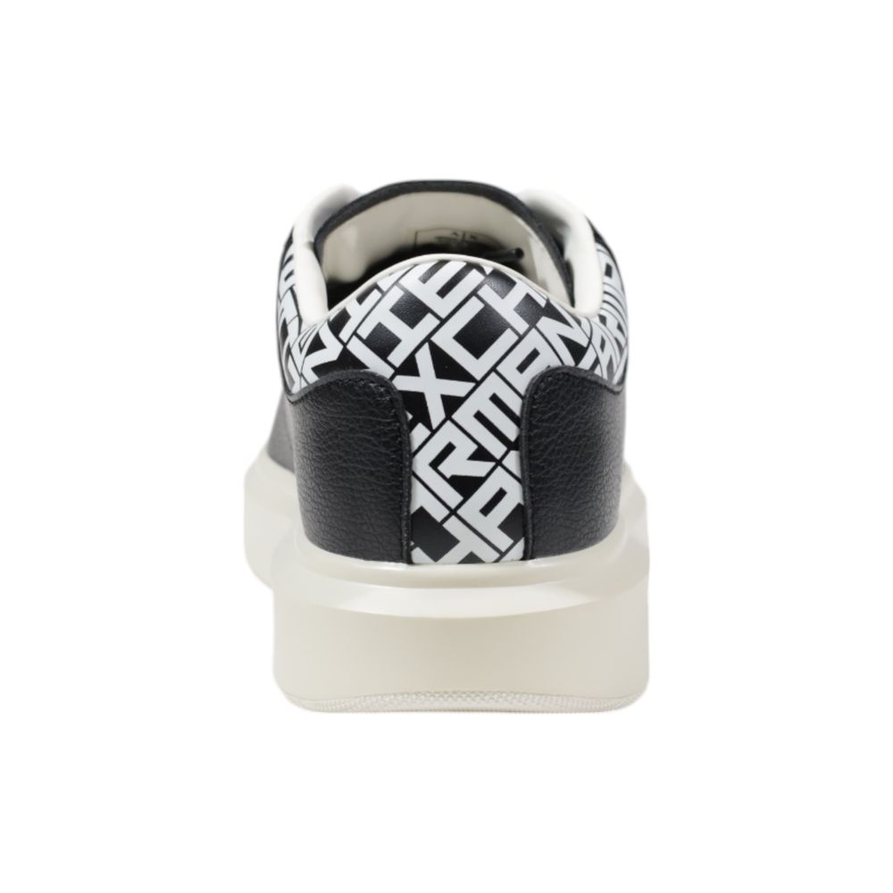 Back view of Armani Exchange Black And White Leather Low Top Sneakers with logo detail on heel