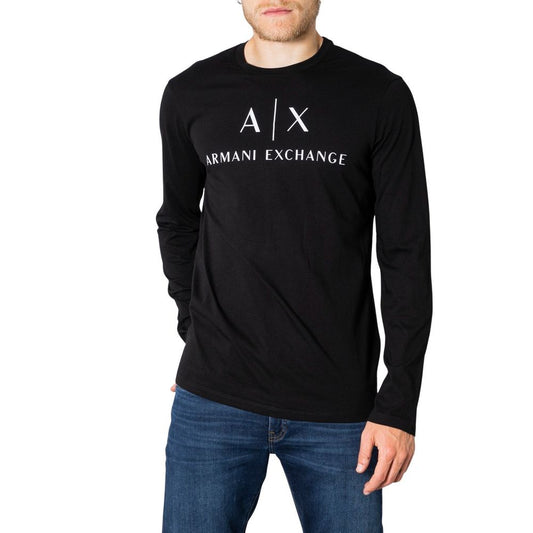 Model wearing Armani Exchange Black Cotton Long Sleeve t-shirt with logo, perfect for a casual yet polished look.