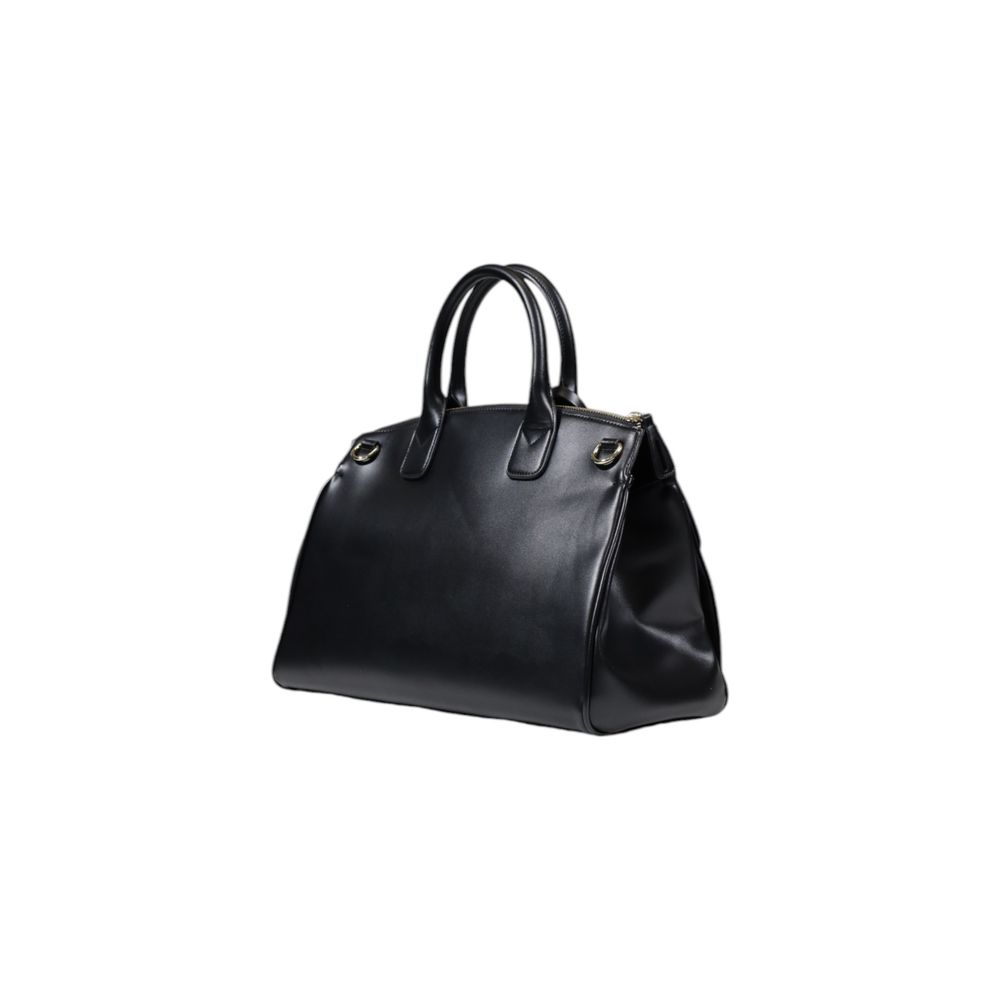 Front view with bag zipped and handles upright.