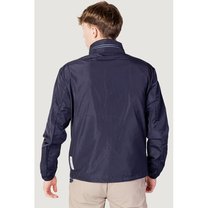 Back view of Armani Exchange Blue Polyester Shell Jacket with double-slider zip and reflective details.